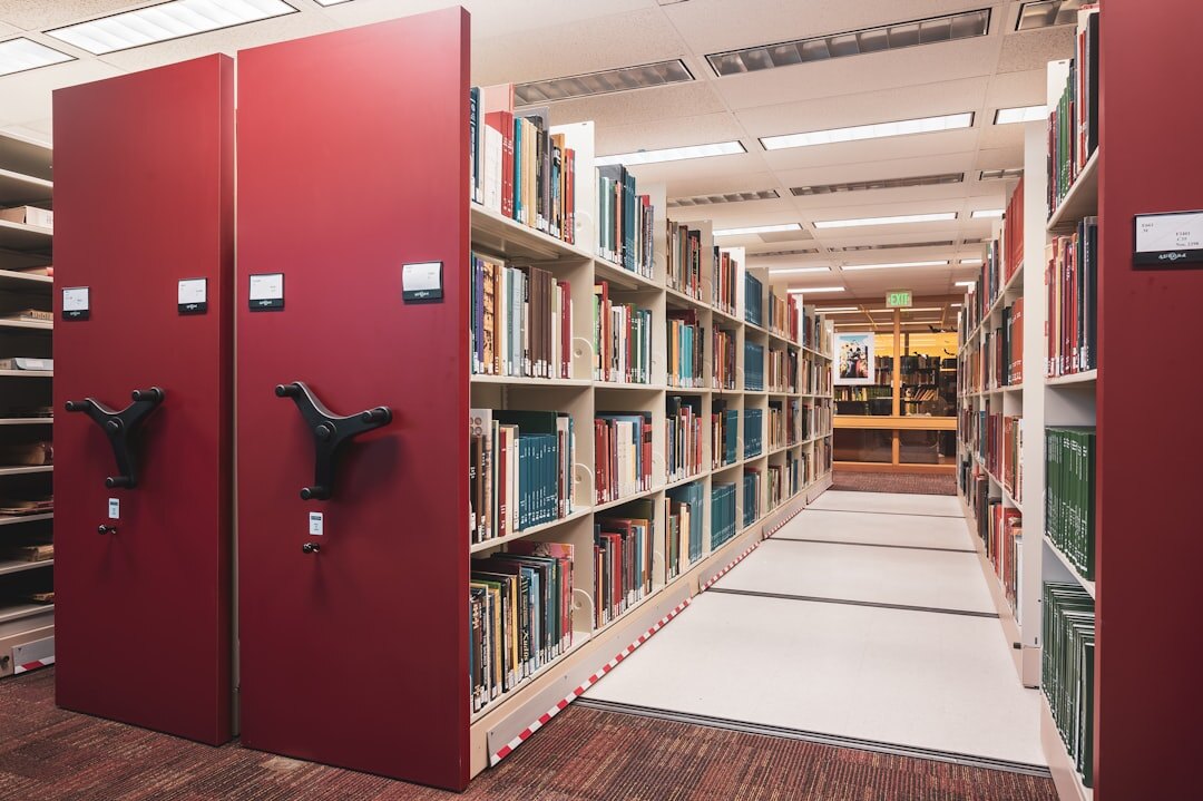 Shelves filled with old film reels and video tapes in an archive